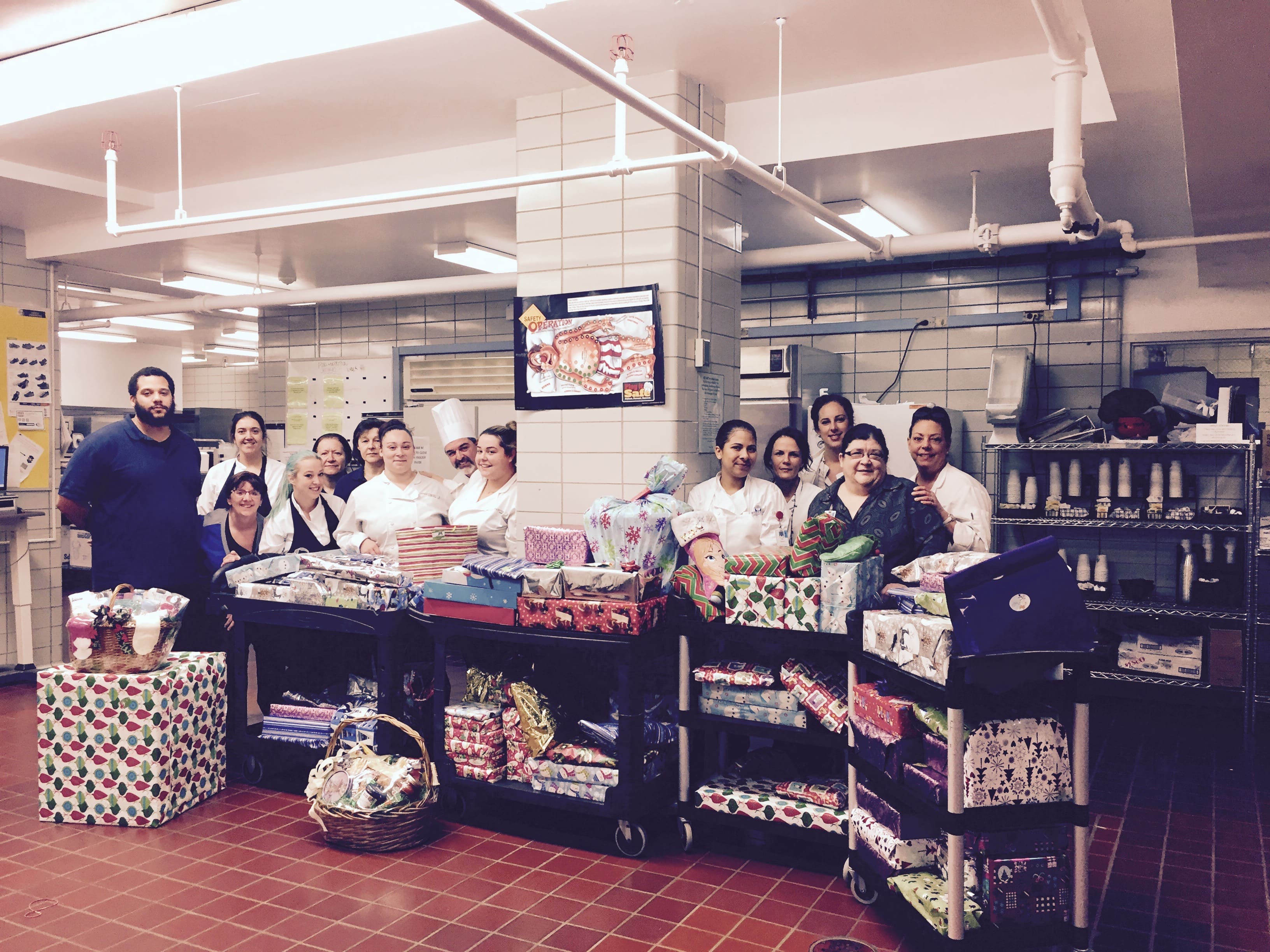 Waterbury Hospital Food & Nutrition Services Team Provided Gifts for a Single Mom and her Four Children This Holiday Season