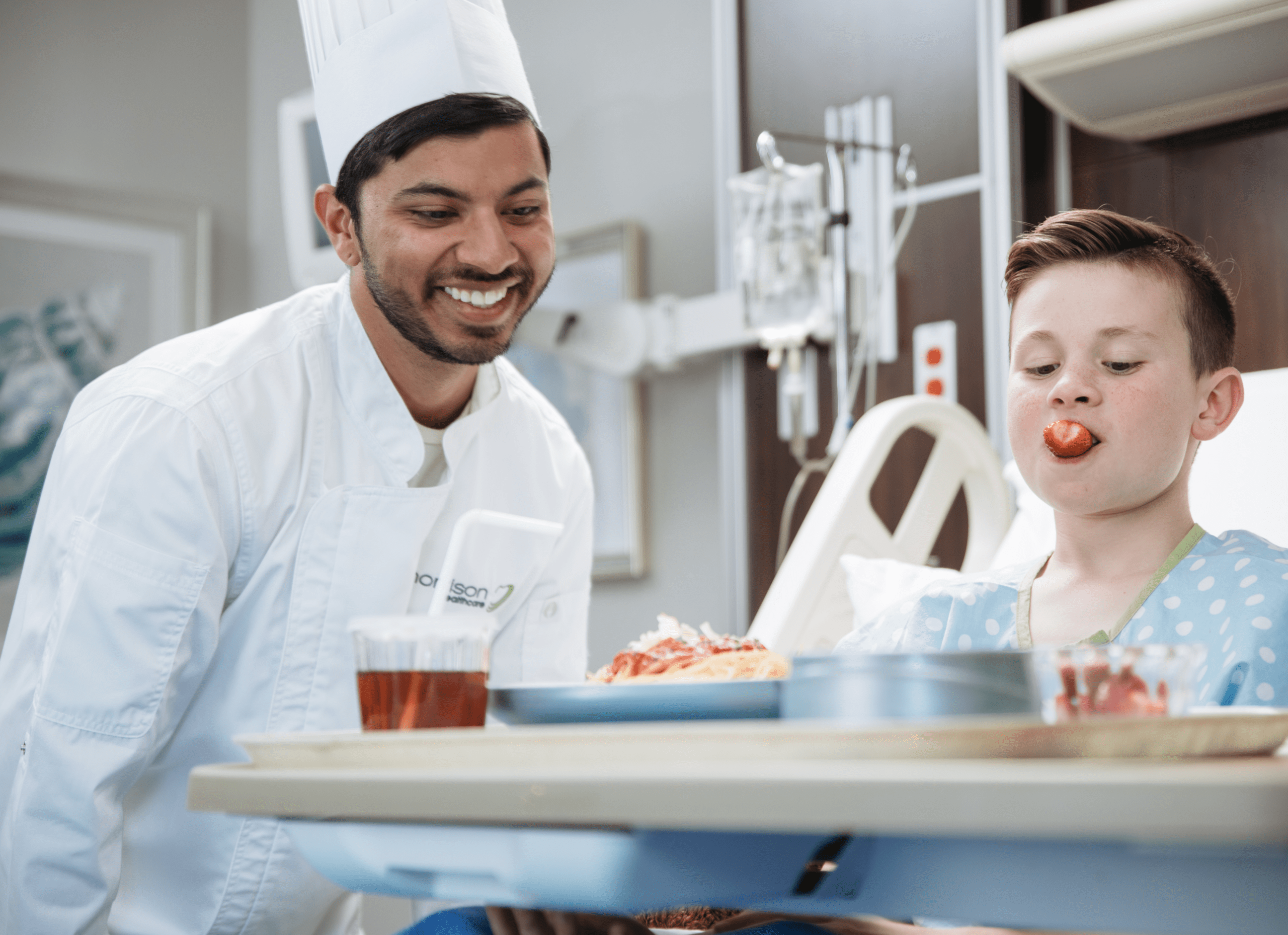 Chef sitting with a smiling patient