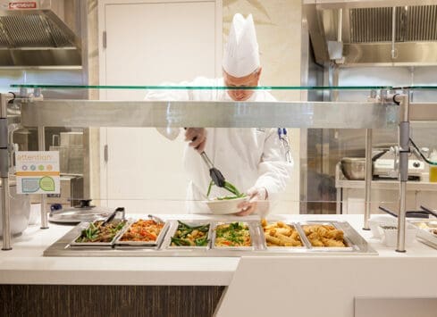 Chef preparing healthy meals in Morrison Healthcare kitchen