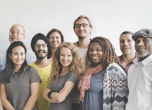 Diverse group of smiling Morrison Healthcare employees standing together