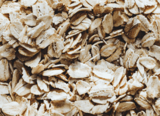 Closeup of rolled oats, a healthy whole grain breakfast cereal