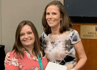 Morrison Healthcare employees smiling together at work event