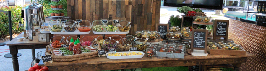 Salad and vegetable bar with various ingredients at Morrison Healthcare restaurant venue