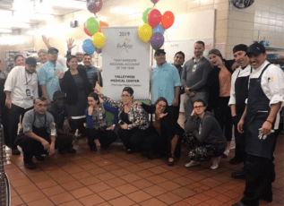 Team Awesome celebrates Regional Account of the Year award at Valleywise Medical Center cafeteria