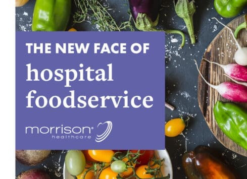The new face of hospital foodservice - fresh vegetables on rustic table with Morrison Healthcare logo