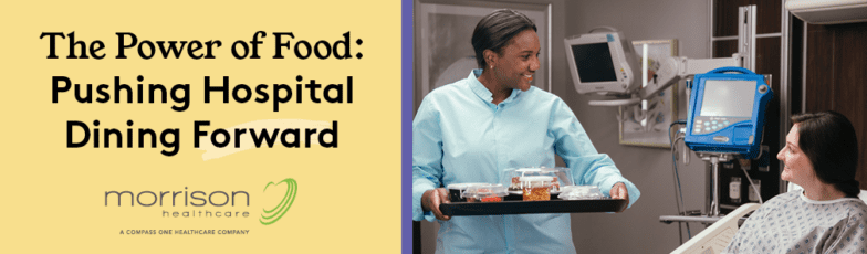 Hospital dining staff serving food tray to patient