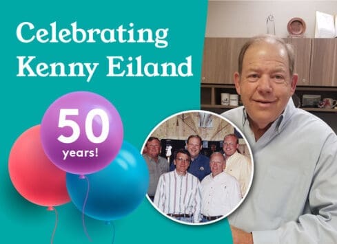 Celebrating Kenny Eiland's 50 years of service with group photo and text overlay on teal background