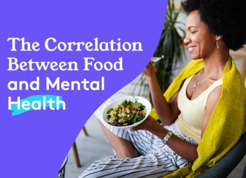 Smiling woman eating healthy salad, exploring the correlation between food and mental health