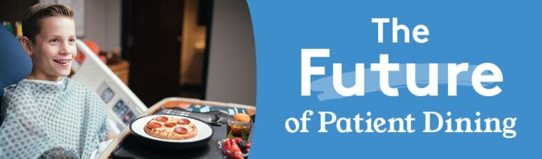 Young patient smiling while being served meal in hospital room - the future of patient dining