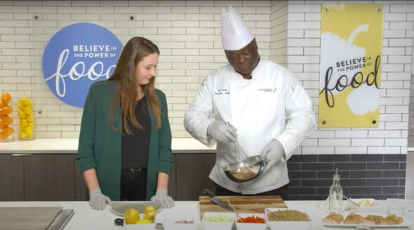 Chef teaching healthy cooking class with 
