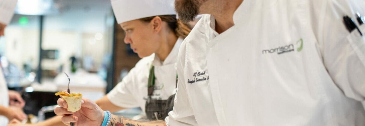 Morrison Healthcare chefs preparing fresh meals in a kitchen