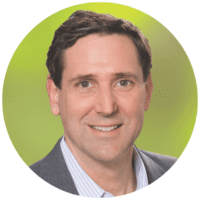 Tim Thoma, CEO of Morrison Healthcare, smiling in professional headshot against green background