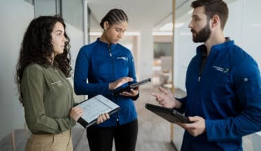 Morrison Healthcare associates discuss work in an office setting