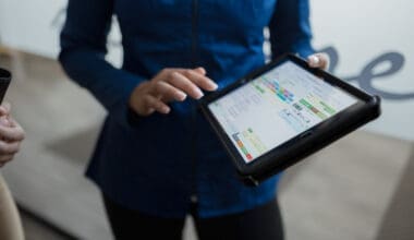 Person using tablet to view nutrition information dashboard