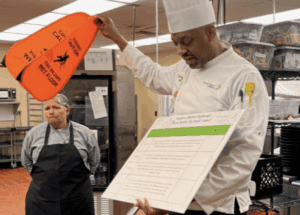 Morrison chef showing safety demonstration
